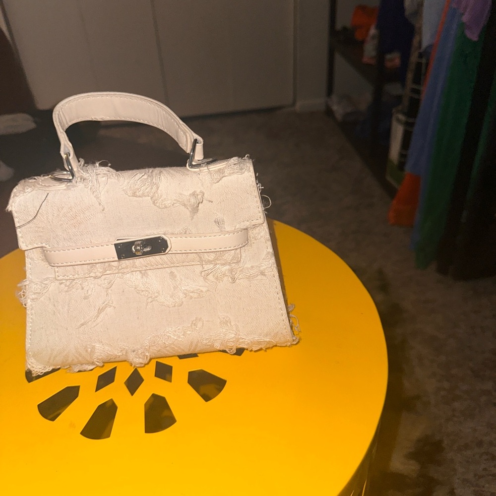 Elegant Cream Textured Handbag